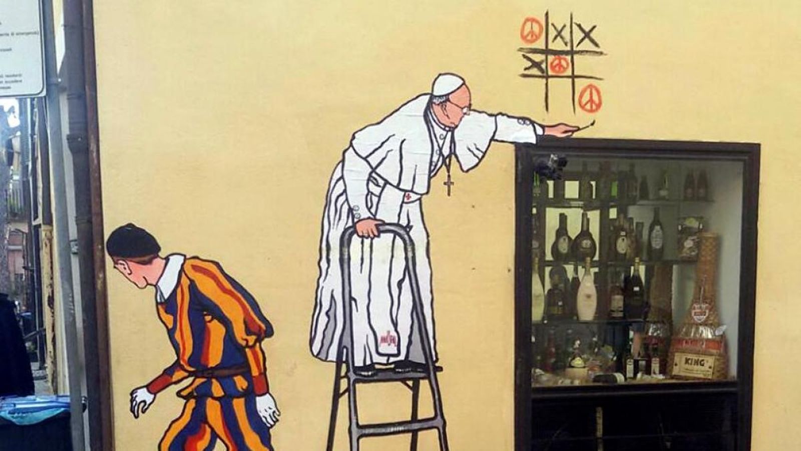 grafiti Francisco y el guardia suizo