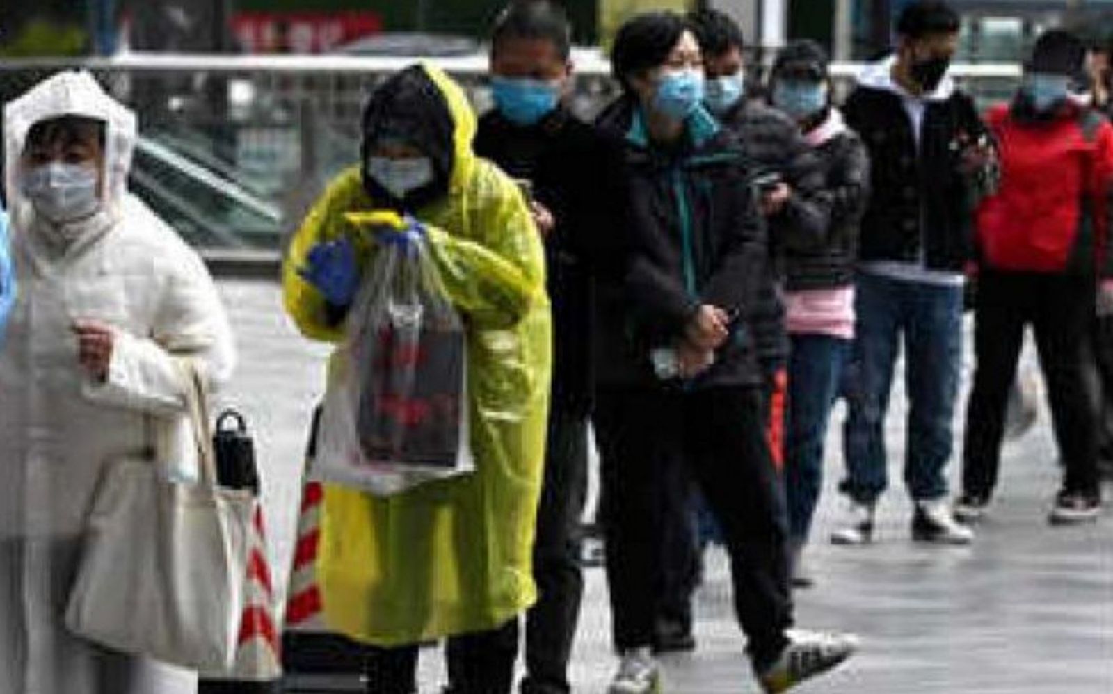 Cola en funeraria. Wuhan, China