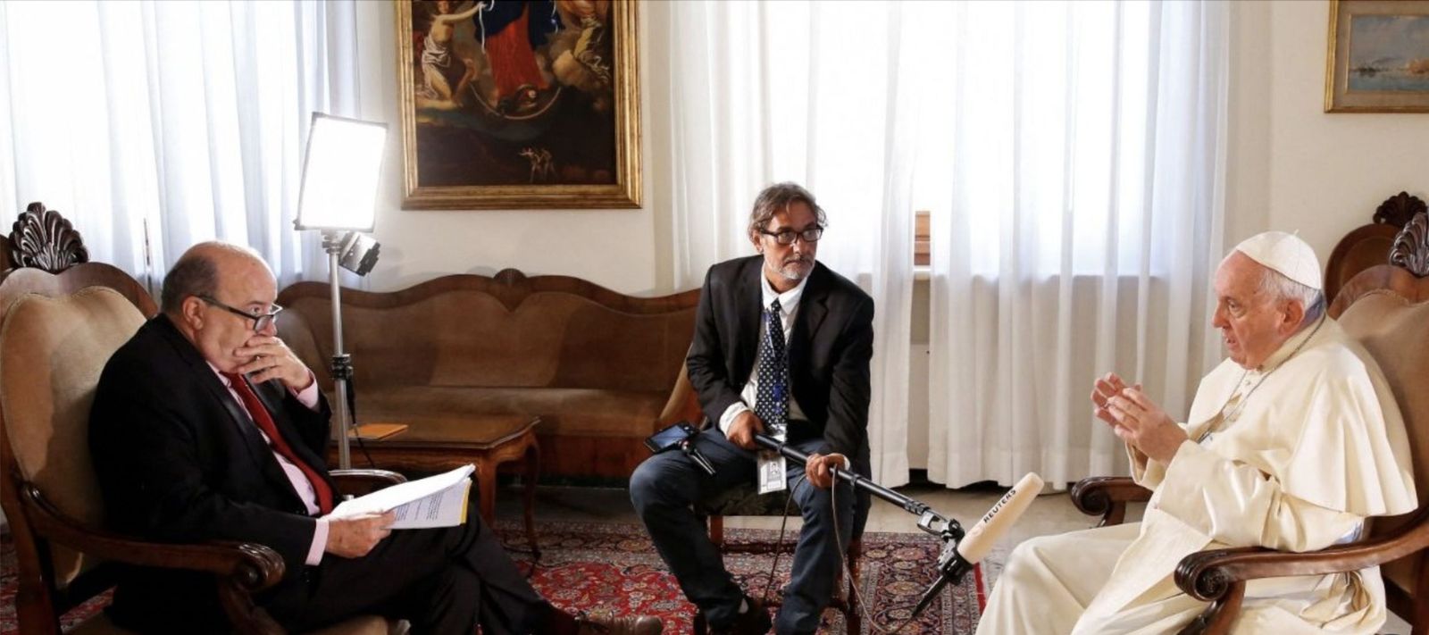 Francisco  con el periodista de Reuters, Phil Pulella