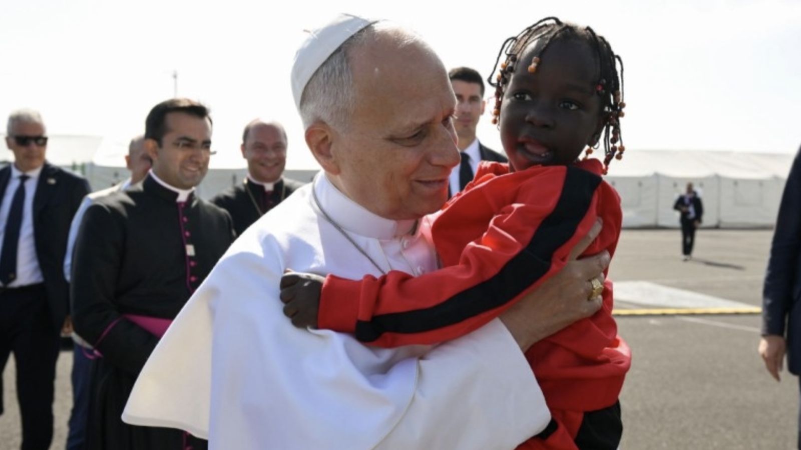 Papa y niña emigrante