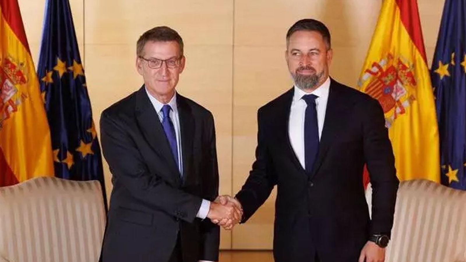 Alberto Núñez Feijoó (PP) y Santiago Abascal (VOX)