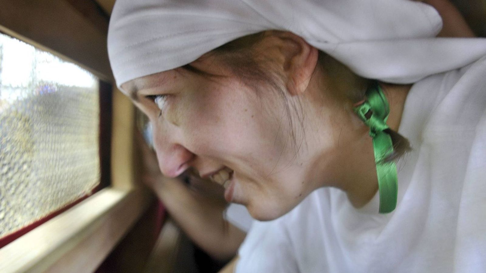 Una costalera del paso de la Hermandad del Trabajo, en Granada