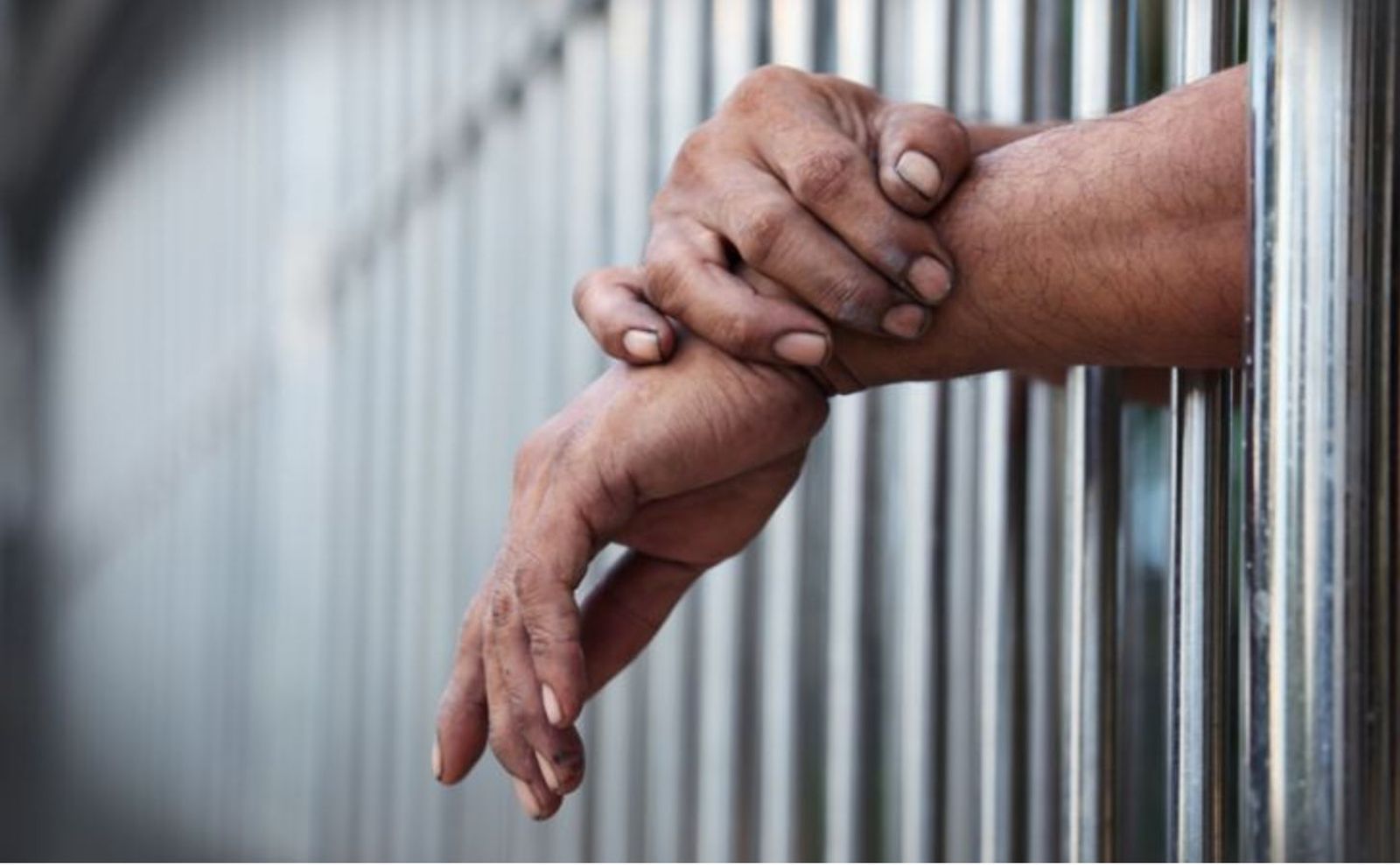 Preso, en una cárcel