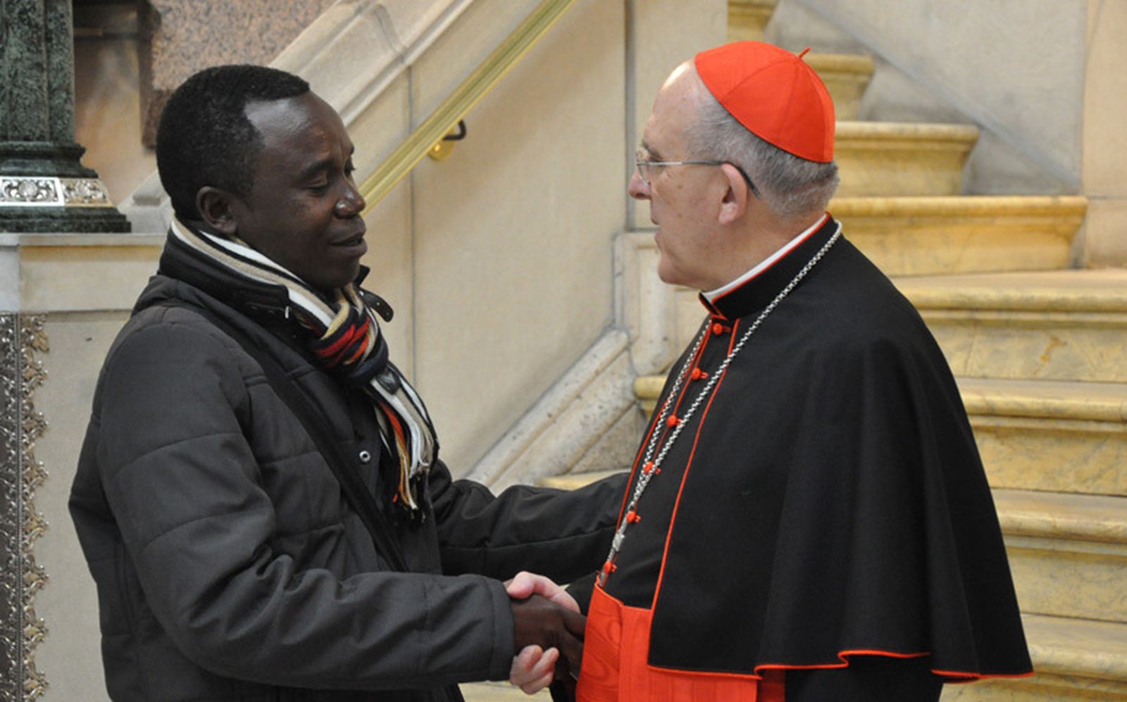 Osoro, con un migrante