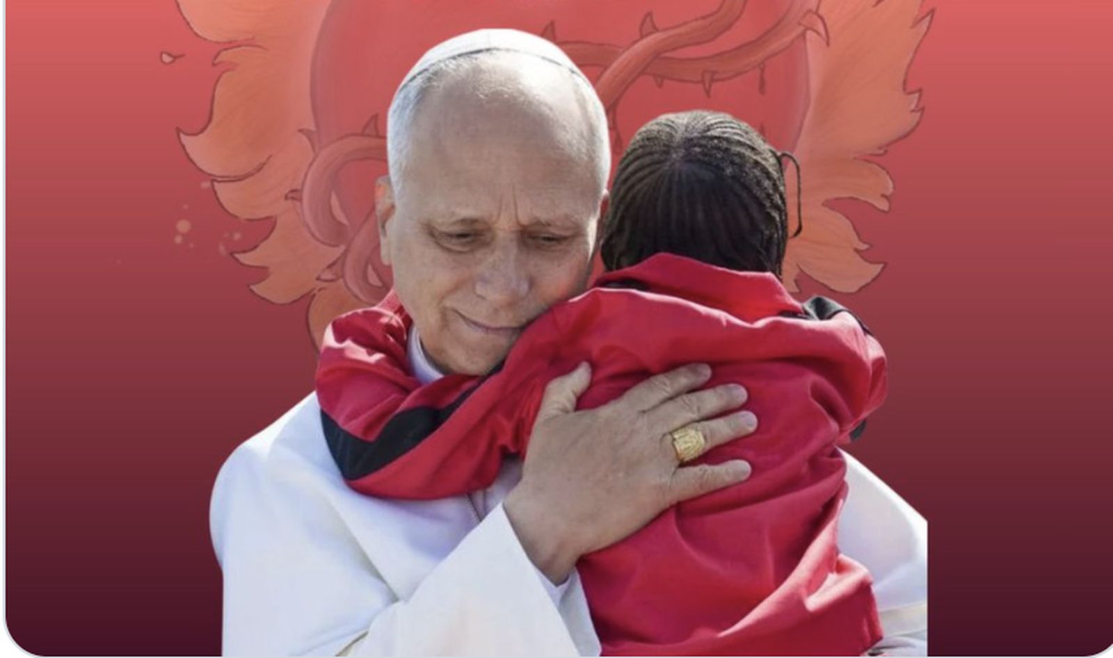 El Papa abraza a una niña emigrante