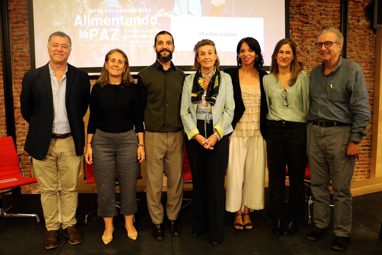 La presidenta de Manos Unidas, con los ponenets de la jornada