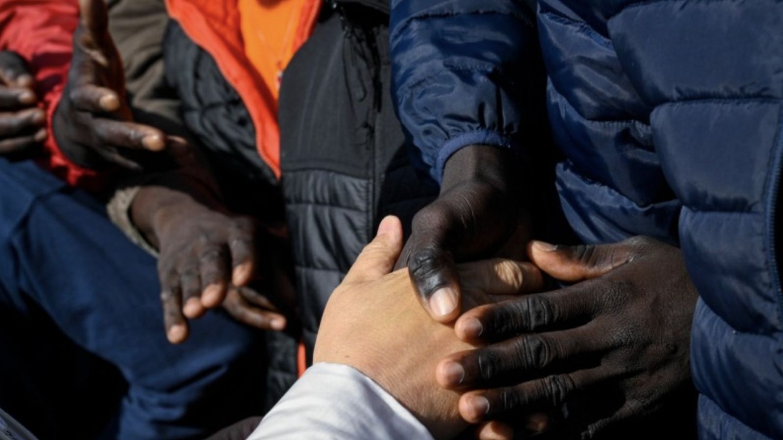 El Papa con emigrantes